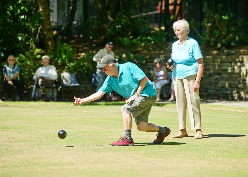 Two Oddfellows members playing Bowls