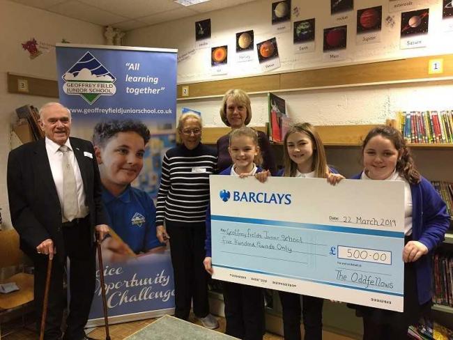 Oddfellows Reading District present cheque to Geoffrey Fiels Junior School
