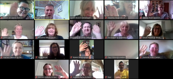 People waving at each other through Zoom video conferencing app