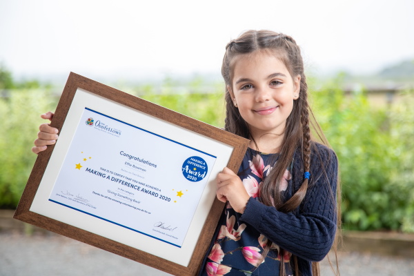 Effie with her certificate