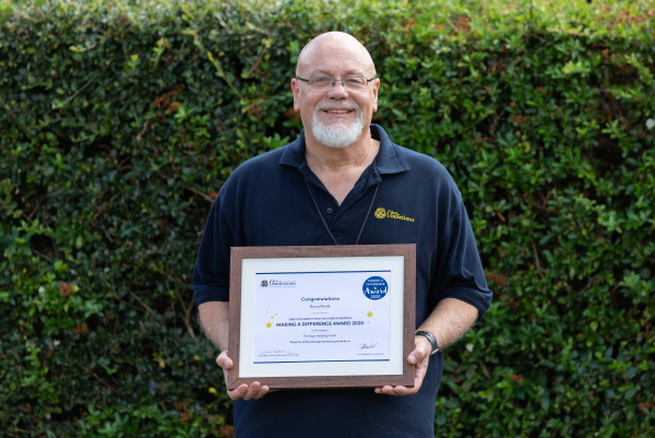 Bruce with his certificate