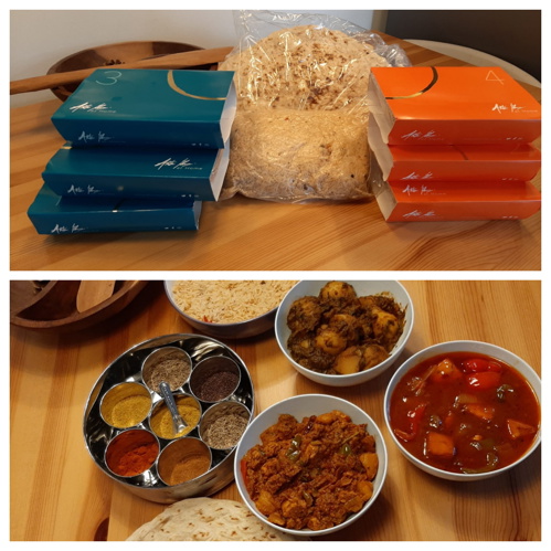 6 pre-prepared boxes of food and a bag with a naan in it. The contents of the Aktar @ Home meal box.