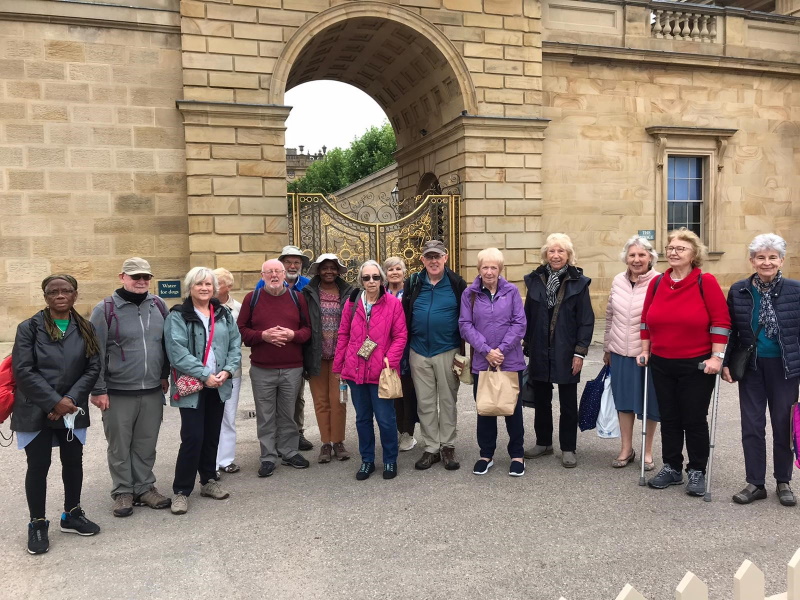 Oddfellows members on a break to the Peak District line up outside Chatsworth House