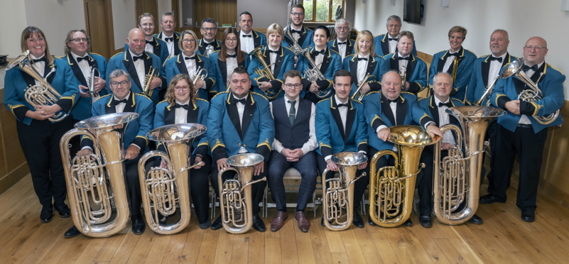 The Oddfellows Brass band sat as a group