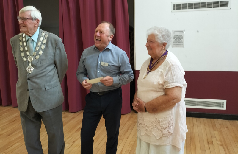 Three representatives from the charity and the Oddfellows making the donation