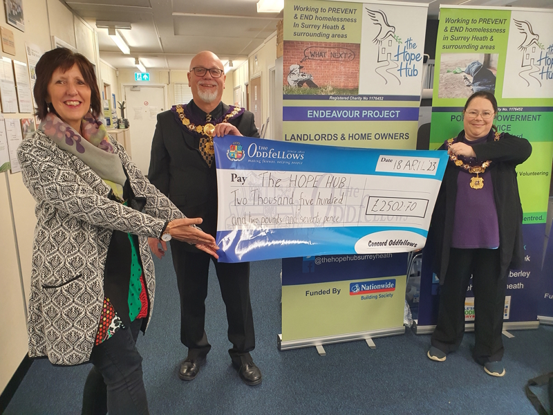 The Hope Hub’s CEO Mags Mercer shown receiving the donation on an oversized cheque from Concord Oddfellows’ outgoing Chairman Bruce Nicole and current Deputy Chairman Hannah Appleby.