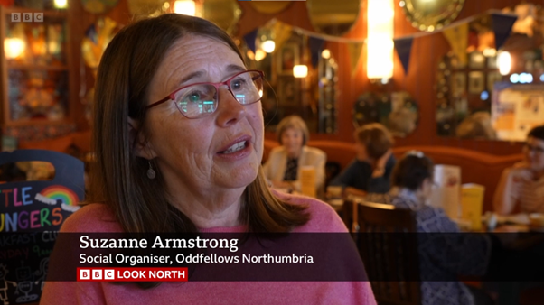A woman being interviewed on TV