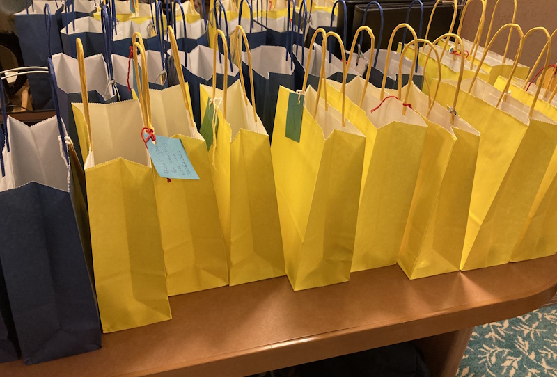 Several yellow paper bags