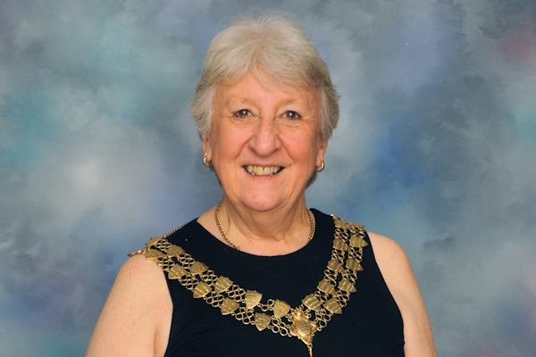 Barbara Needham with the Grand Master's chain around her neck
