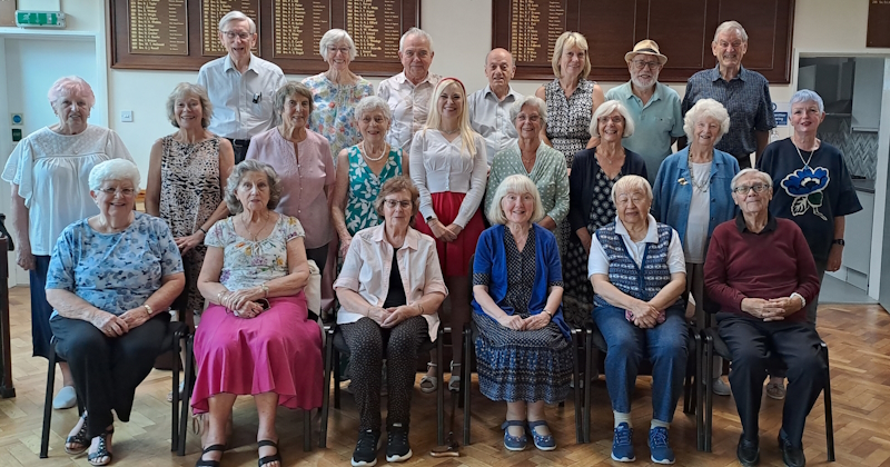 22 members of the choir in a group picture