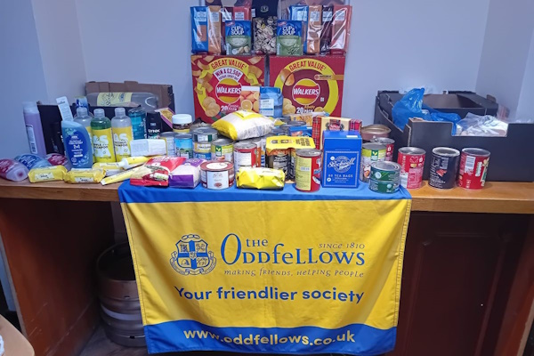 food donations with an oddfellows banner