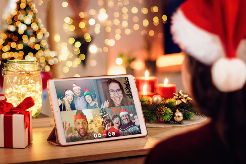People wearing festive outfits during an online event