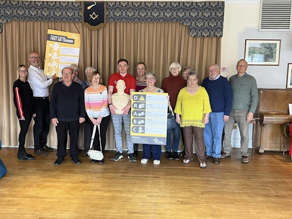 Babergh members stood with volunteers from the East Anglian Air Ambulance